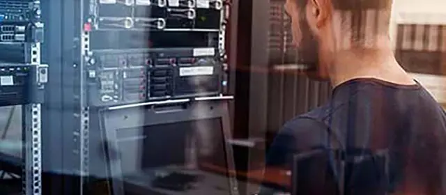 Man Working On Server Rack
