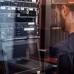 Man Working On Server Rack