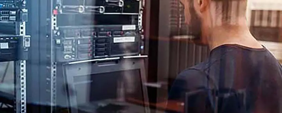 Man Working On Server Rack