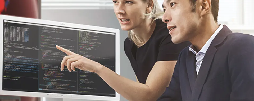 Man Woman In Front Of Monitor