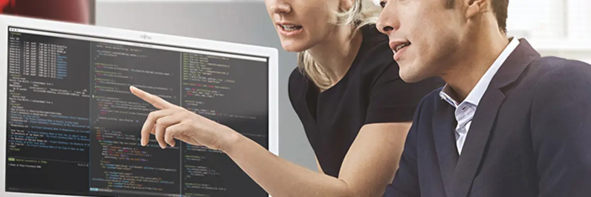 Man Woman In Front Of Monitor