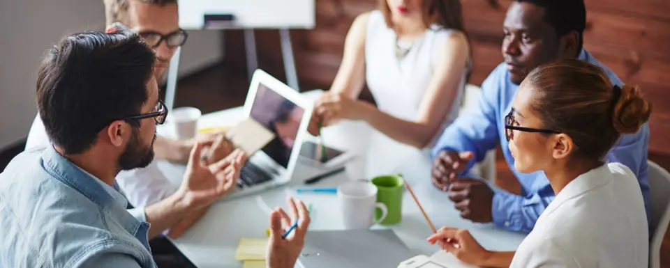People Working Together At A Table