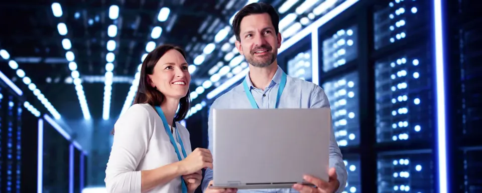 Woman and Men Talking in Data Center