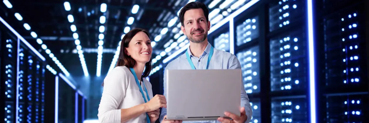 Woman and Men Talking in Data Center