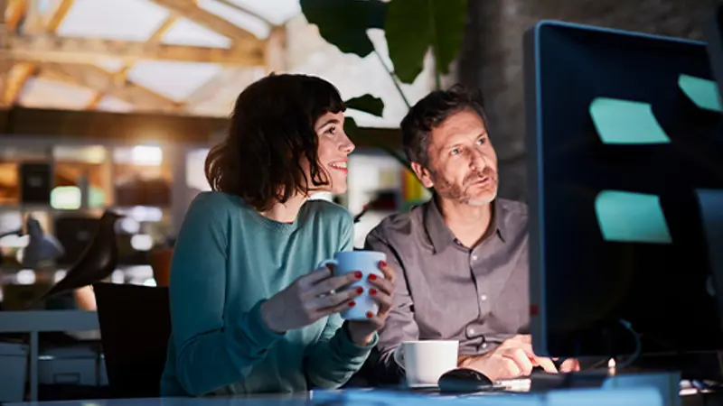 Man And Woman In Office