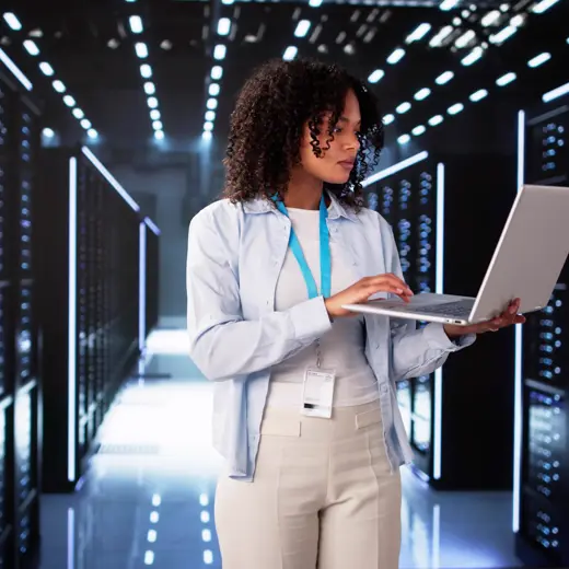 Woman With Notebook Searching In A Data Center