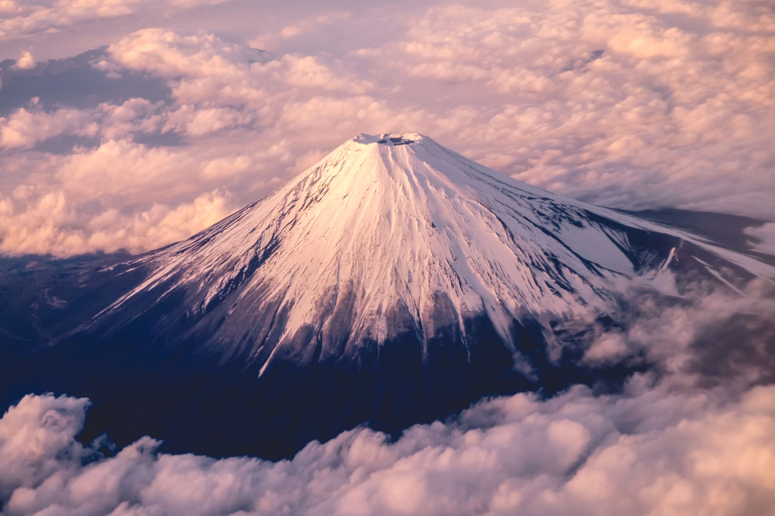 Snow Capped Mountain Peak During Sunrise