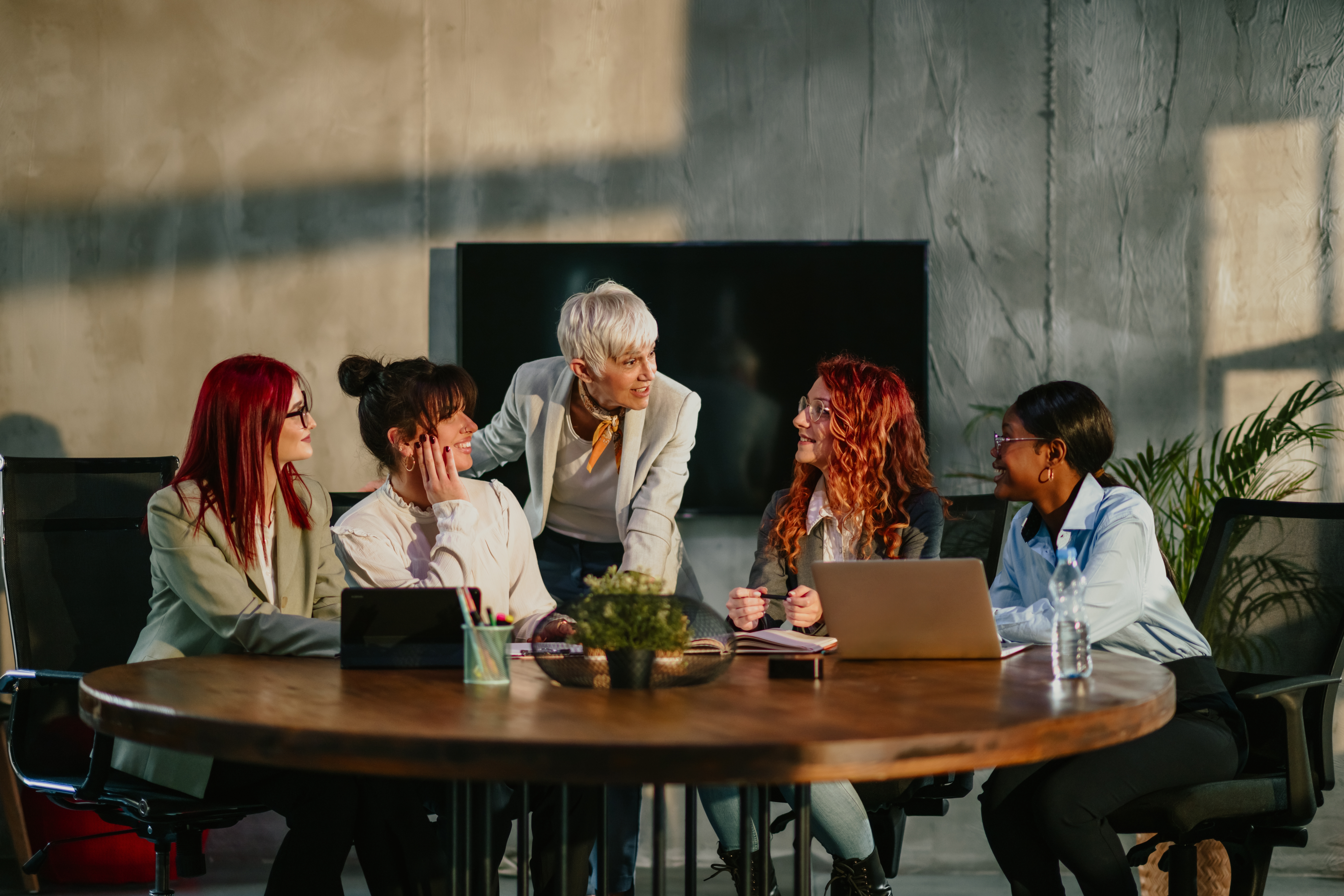 Women Around Table Discussing