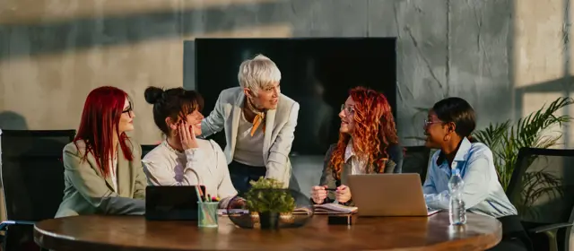 Women Around Table Discussing