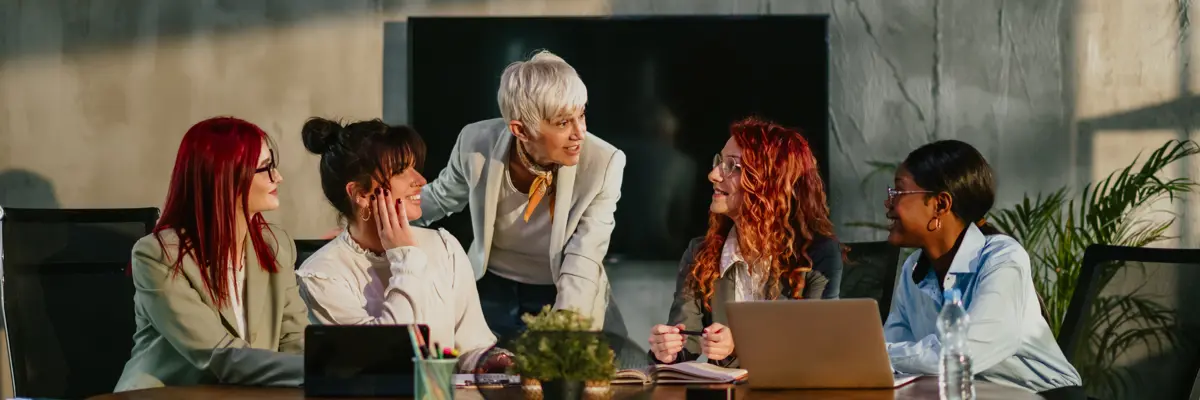 Women Around Table Discussing