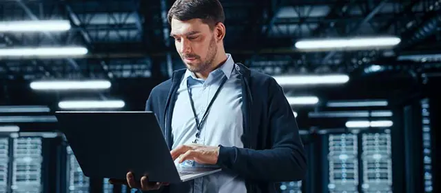 Man Standing With Notebook