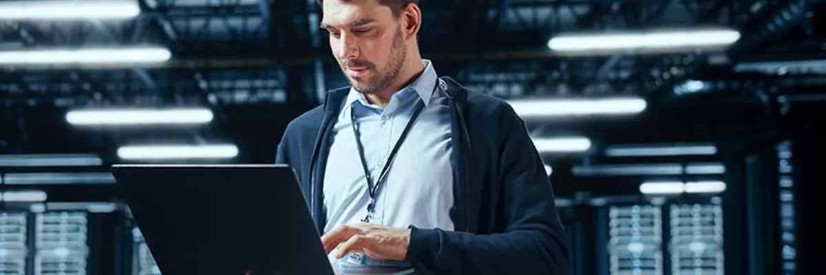 Man Standing With Notebook