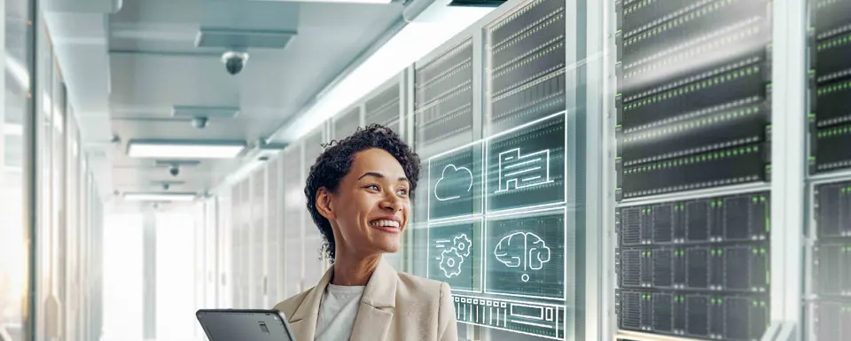Woman In Datacenter Holding Tablet