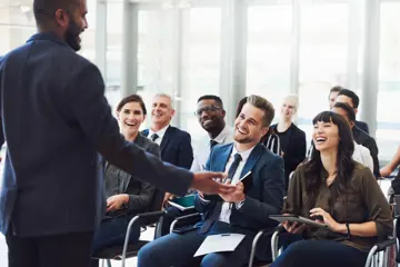 Group Of People At Meeting