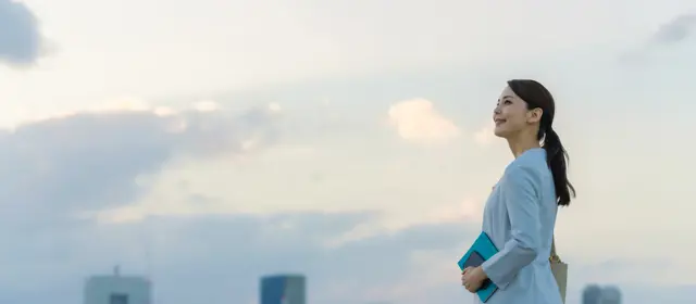 Woman Looking At City