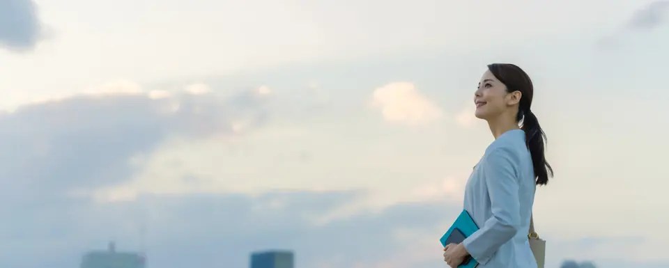 Woman Looking At City