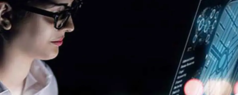 Woman Glances At Monitor