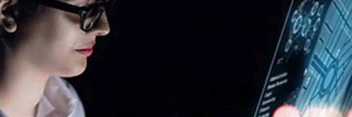 Woman Glances At Monitor